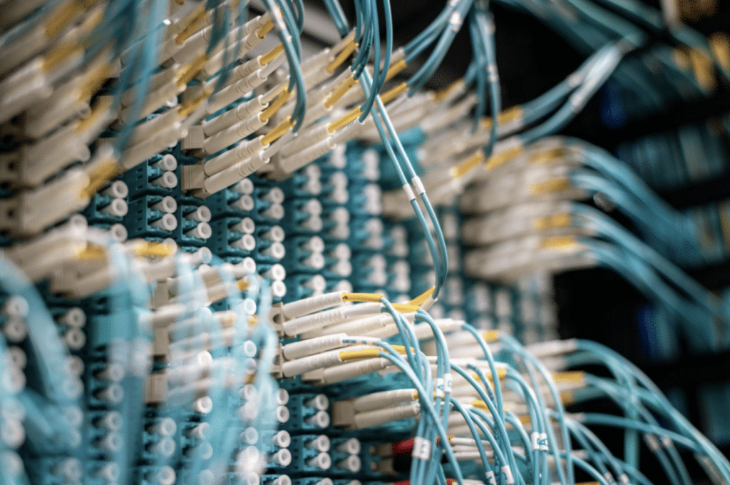 The Power of Fiber: Why Carrier Networks Choose Fiber Optics over Copper